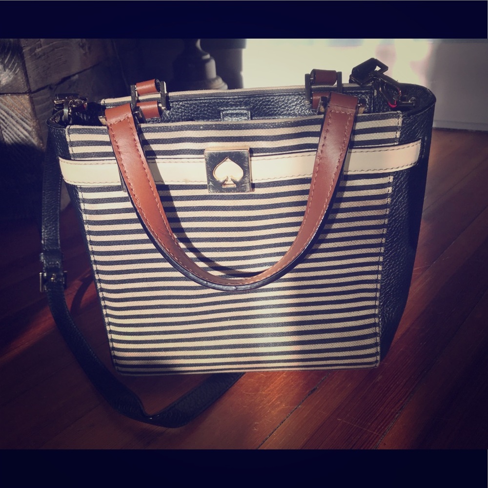 Kate spade striped purse with pink interior